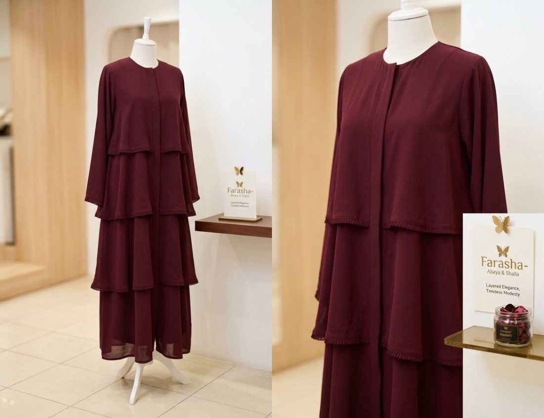 Burgundy layered abaya, displayed in the boutique